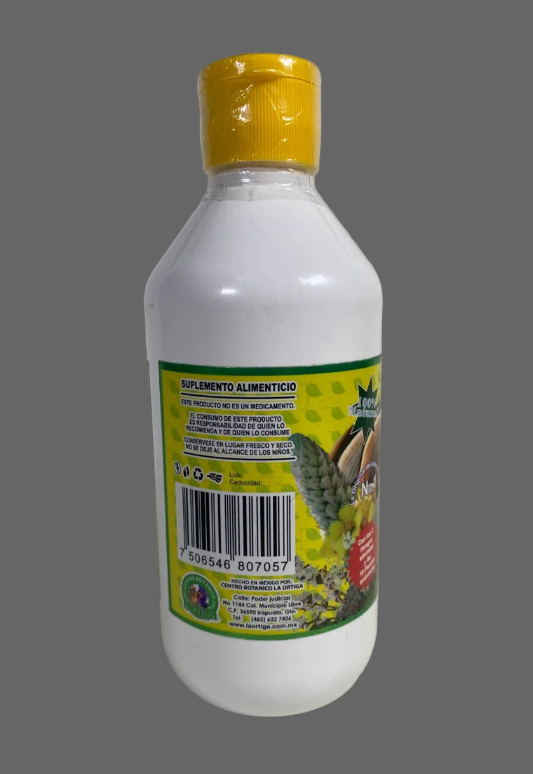 Bottle with a yellow cap and colorful label on a white background