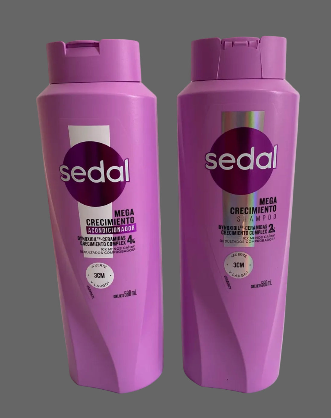 Two purple Sedal Mega Crecimiento hair growth shampoo bottles standing side by side against a plain off-white background.