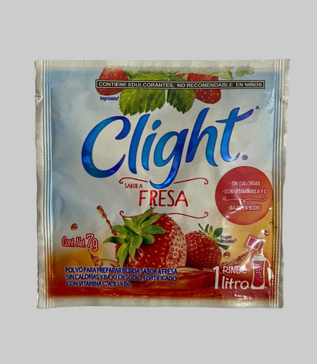 A single packet of Clight Fresa Strawberry milk powder, featuring a light blue and orange design with illustrations of fresh strawberries and green leaves, placed on a plain off-white surface.