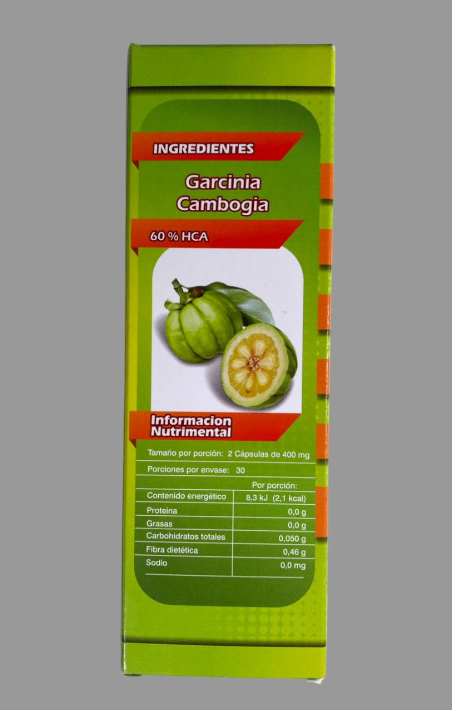 Green box of Garcinia Cambogia supplement on a white background