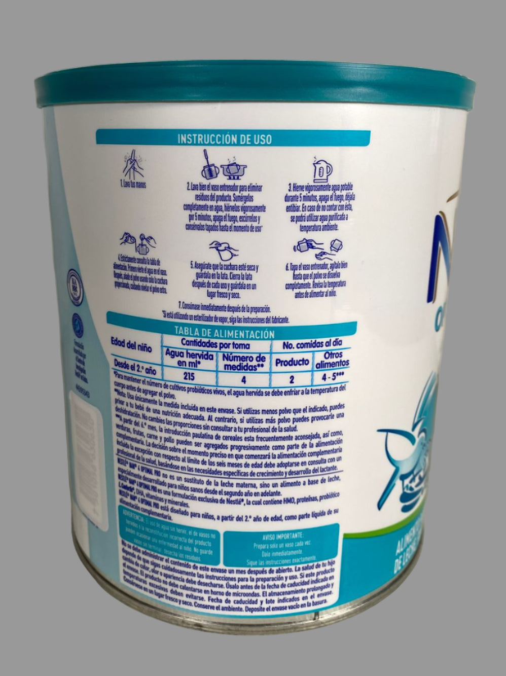 Back view of a baby formula can with text and branding on a plain background