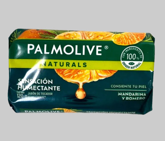 A green palmolive bar of sope in its packaging on a grey background