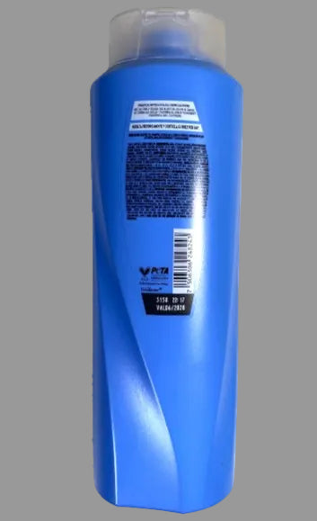 Blue shampoo bottle with label on a white background