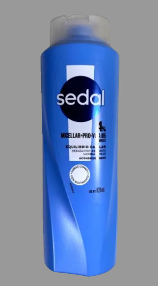 Blue bottle of Sedal product on a gray background