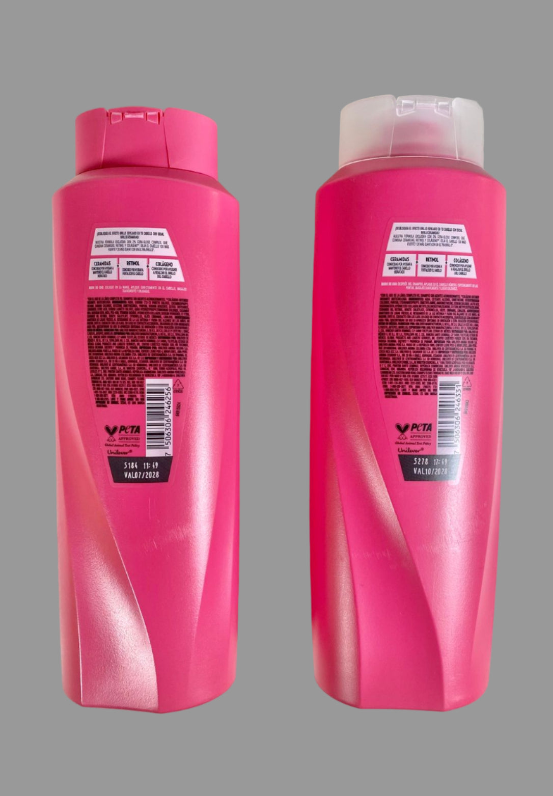 Two pink shampoo bottles with labels on a light gray background