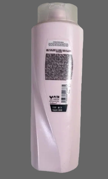 Shampoo bottle with label on a white background