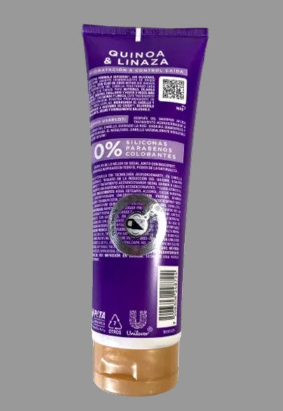 Purple shampoo bottle labeled 'Quinoa & Linaza' on a white background