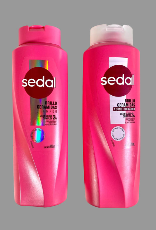 Two pink Sedal shampoo bottles on a light background