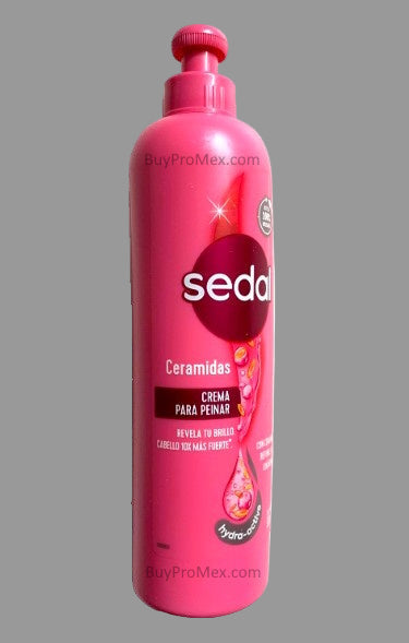 A pink bottle of SEDAL hair styling cream with a pump dispenser, labeled Crema Para Peinar with ceramidas.