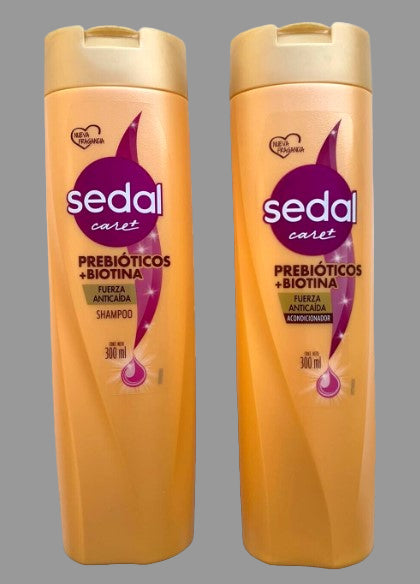 Two bottles of Sedal Care+ Shampoo and Conditioner with a predominantly yellow label, featuring text and branding.