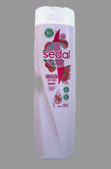 A bottle of SEDAL Natural Collection Raspberry Shampoo, 300ml size, with a white and pink label featuring raspberry graphics.