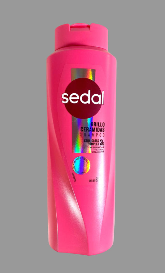 Pink shampoo bottle with 'sedal' branding on a white background